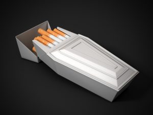 pack of cigarettes as funeral coffin - smoking kills 3d concept